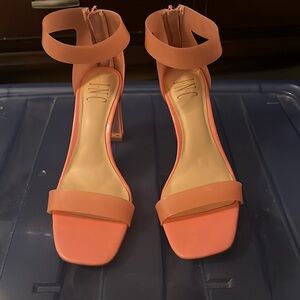 INC pink clear pumps